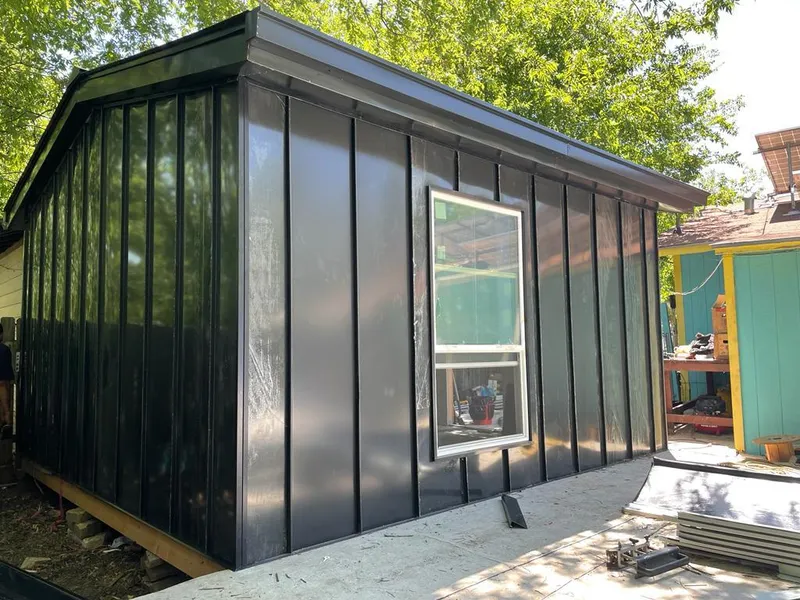 Black standing seam metal wall panels for Metal Roof Installation in Lisbon